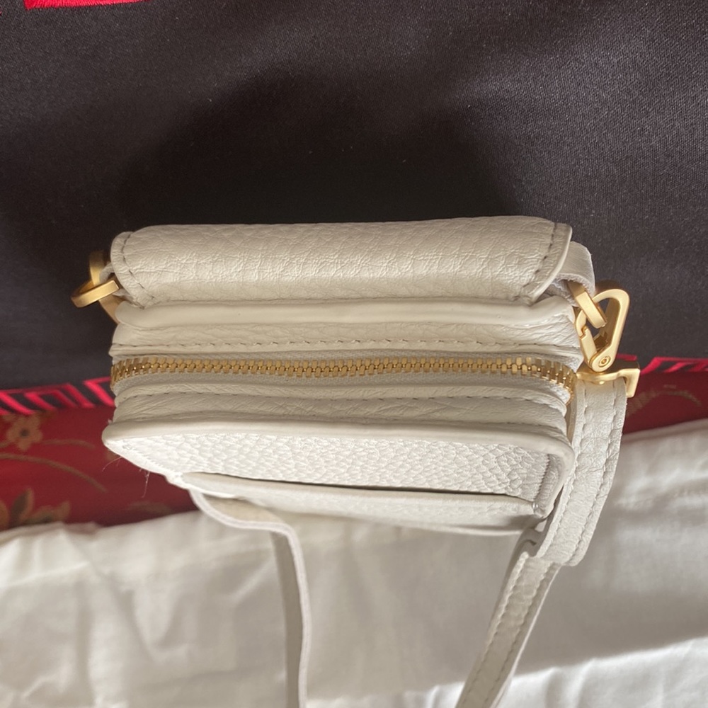 Making moves in a marshmallow white, bright Hammitt 310 west chic crossbody! - Picture 5 of 12